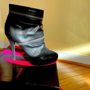 Michael Antonio black boots.